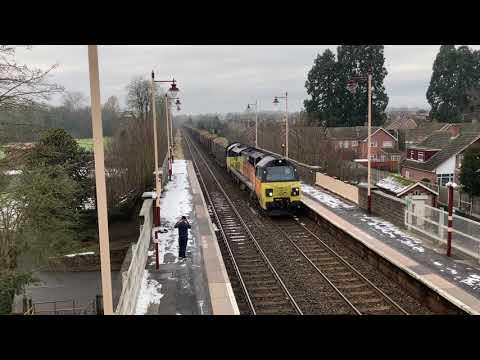 The return of the 6j37 Chirk - Carlisle log train with 70802