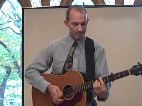 "Marching into the Light," performed by Rev. Fred Small, written by Andres Useche