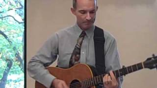 &quot;Marching into the Light,&quot; performed by Rev. Fred Small, written by Andres Useche