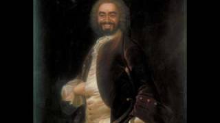 Kadr z teledysku Figaro tekst piosenki Luciano Pavarotti