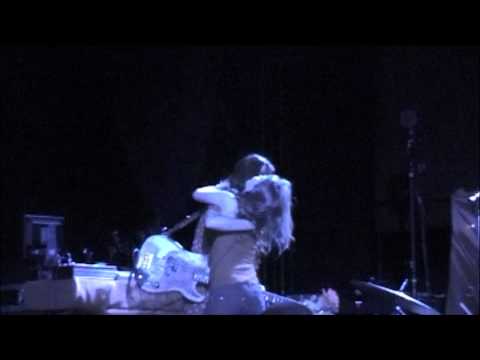 A crazy girl attempts a make out session with Paz Lenchantin in Detroit.