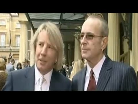 Status Quo's Rick Parfitt & Francis Rossi Receive Their O.B.E (BBC News)