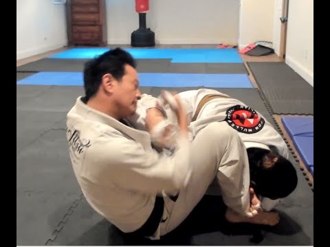 Greg Lee BJJ blackbelt rolling , Ude Gatame finish (upside down armlock)
