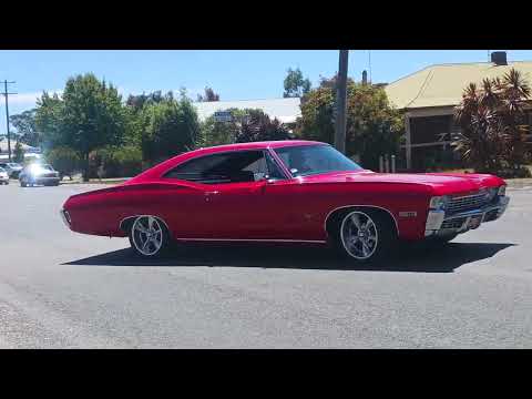 Chevy Impala and Chevy Ute leaving Meredith car show.