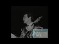 Chris Isaak and Silvertone performing "Move Along" (audio from 1990)