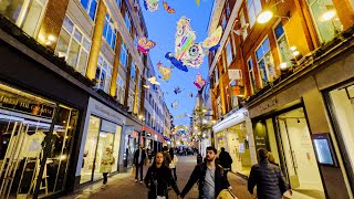 London Evening Walk around Carnaby Street the centre of mods culture and current shopping mecca.