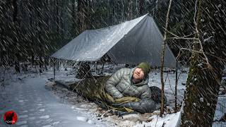 Cowboy Camping in the Snow During a Freezing Rain Storm
