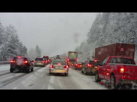 SNOQUALMIE PASS STORM, POLICE, FIRE, PASS CLOSED, STUCK IN TRAFFIC, PEOPLE UNPREPARED