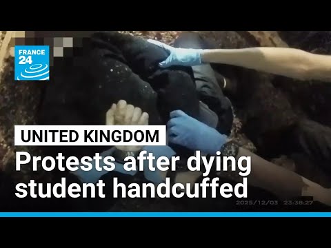 'I can't breathe': protesters clash with police over handcuffed dying student