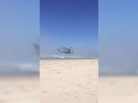 Marine helicopter lands on North County beach