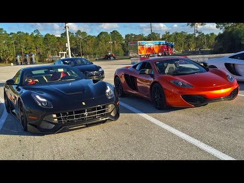 Ferrari F12 Berlinetta vs McLaren MP4-12C Drag Racing 1/4 Mile using Launch Control