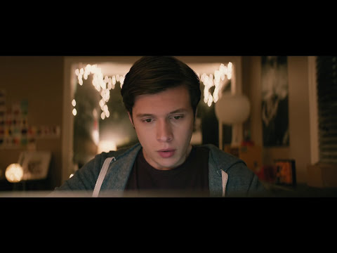 Love, Simon trailer frame of Simon staring out the car window on the way to school