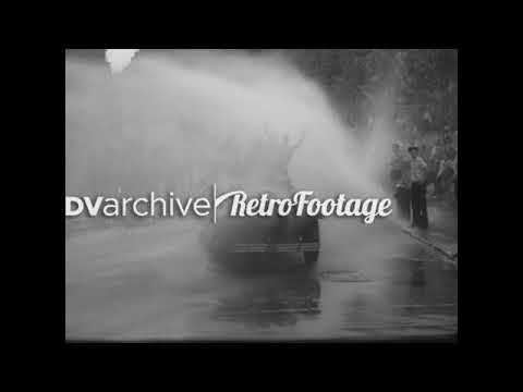 1936 - Children open fire hydrants in New York City