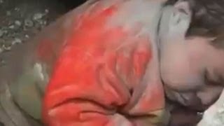 Syrian child found alive under rubble of bombed building