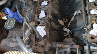 Easy way to take out water, coolant, that fell inside sparkplug well.