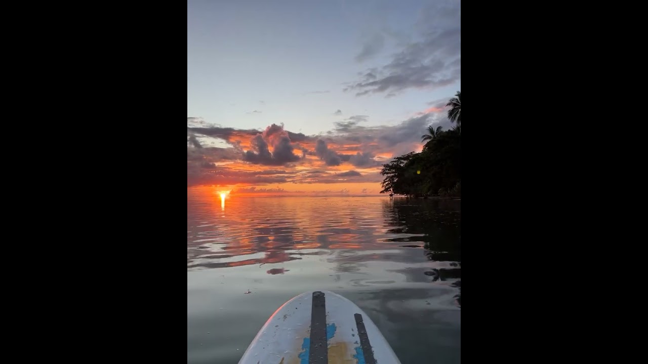 Paddle boarding at sunset in PNG