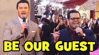Luke Evans &amp; Josh Gad Sing &quot;Be Our Guest&quot; At BEAUTY AND THE BEAST World Premiere