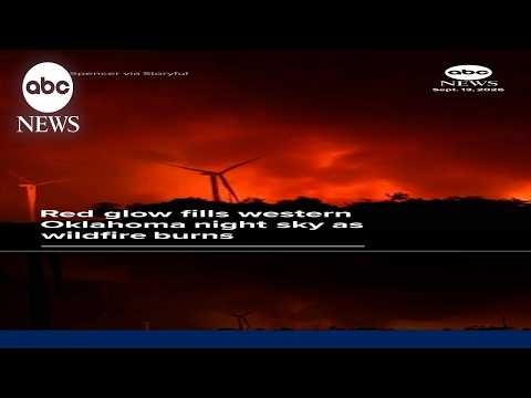Red glow fills western Oklahoma night sky as wildfire burns