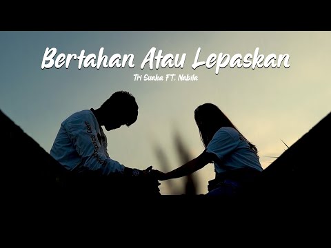BERTAHAN ATAU LEPASKAN (LIRIK) NABILA MAHARANI FT. TRI SUAKA