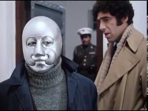 Thumbnail of the video: elliot gould interrogates a robot spy...