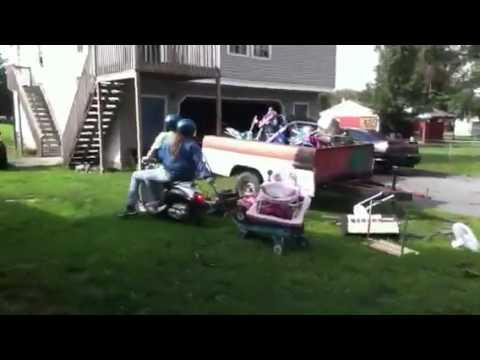 Funny moped pulling stuff