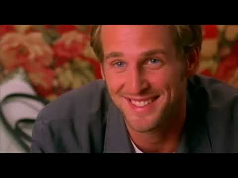 Sweet Home Alabama 2002 trailer still — Reese Witherspoon between Manhattan lights and a small-town fair
