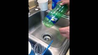 Clear a sink drain easy with a empty 2 liter bottle