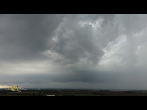 Drone view of stormy clouds during passage of weather system in...