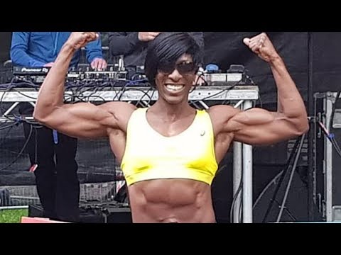Fit over 40 - Andrea Corbett flexing hard muscles