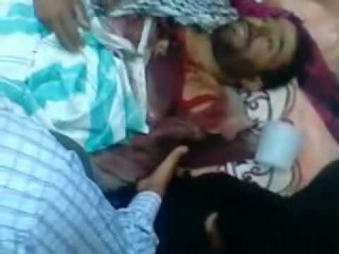 جثمان جاسم مصطفى العلي أحد عناصر كتيبة عائشة في بلدة سلوك في ريف الرقة