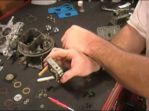 Assembly of Holley Carburetor Metering Block during rebuild