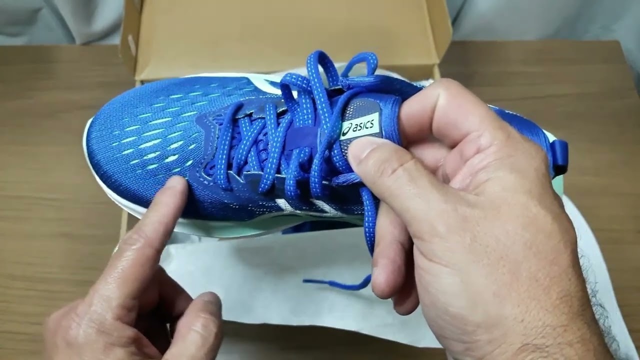 Watch Now Tênis Asics Novablast 2 Feminino ( Azul e Verde ) Tênis Asics Novablast 2 Feminino ( Azul e Verde )