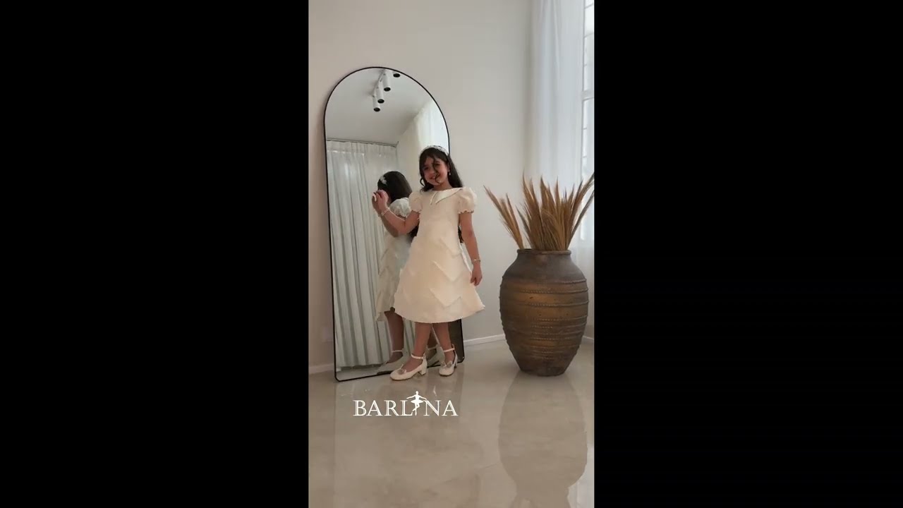 Off-white girls' dress with embroidered fabric - year 1