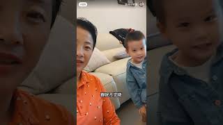 孙子自己会穿衣 就是勿晓得大起来啊是读书格料