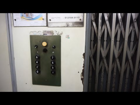 Amazing original gated 1957 OTIS traction elevator @ 84-86 Java Road, Hong Kong