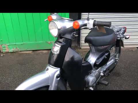 Four Honda Little Cubs