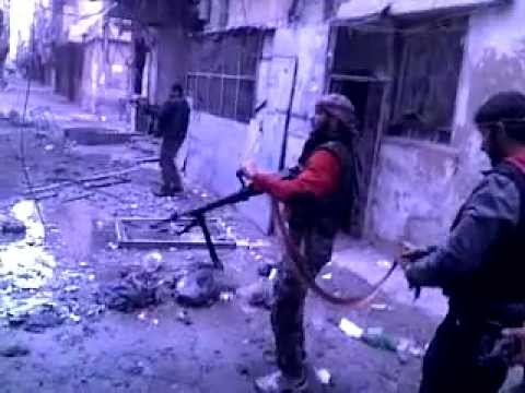 اشتباكات بين كتيبة صقور الجولان وقوات النظام في حي التضامن في مدينة دمشق