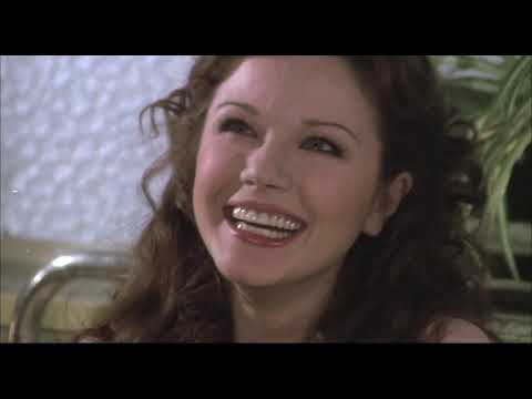 Agostina Belli e Christian De Sica in Conviene far bene l'amore