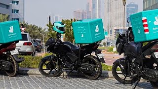 food delivery Dubai.workshope tour.pizza Delivery bikes.