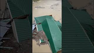 Deadly Kentucky Floods Carry Building Down River