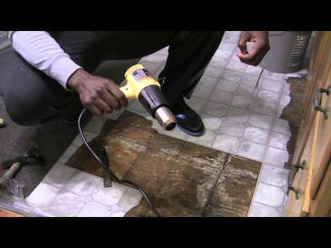 How to remove vinyl sticky tiles - YouTube