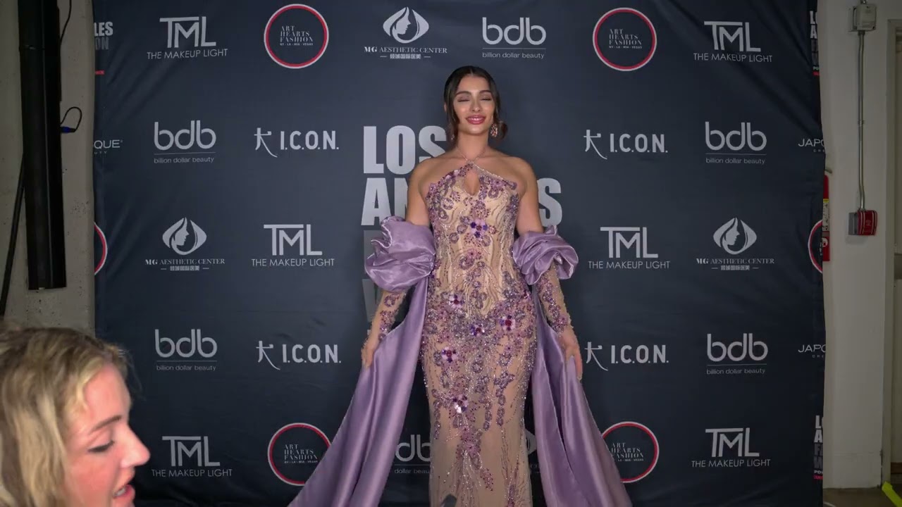 Model Andrea Aguilar poses wearing Glaudi at Art Hearts Fashion LAFW