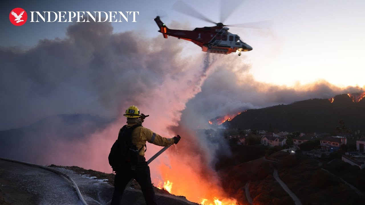 Aerial view of California wildfires as blaze continues to rage