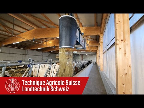 Automatic system for feeding grass, hay and mixed rations and bedding straw