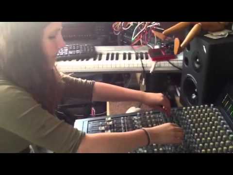 Bliss Zion mixing down her production at Roots Injection St