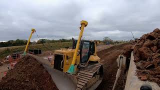 CAT D6N CUTTING AND TRIMMING ROAD USING GPS...