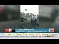 Driver shot dead while calling 911 suspect still.