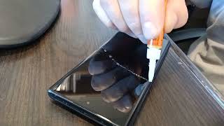 Repair your cracked screen with super glue!
