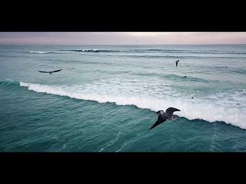 Drone shots and scenic footage of surfing at Valdovino