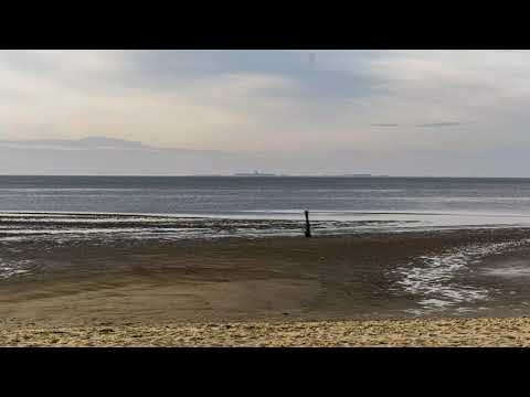[Zeitraffer] Steigende Flut im Wattenmeer vor Sahlenburg mit Blick auf die Insel Neuwerk